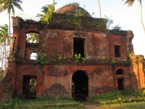 The ruins of the gallows atop a hillock.