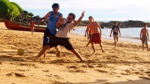 Enjoying a game of beach football