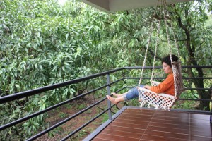 A tourist relaxing and admiring the greenery of the monsoon