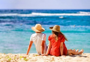 Tourist relax at a Tarkarli beach.