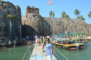 Tourist enter the Sindhudurg fort after a short jetty ride.