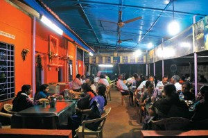 Tourist enjoy their meal at the Athithi Bamboo restaurant in Malvan