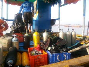 Oxygen tanks and other equipment on board during a Commercial Scuba Dive in Tarkarli
