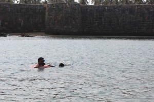 A diver is taken around the water before his dive