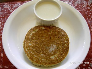 khapar poli with sweet coconut syrup