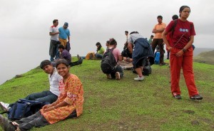 Trekkers relax at the summit. 
