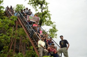 Trekkers pose for snaps at the iron stairway at Sudhagad Fort