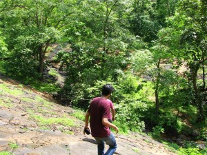 A trekkers makes his way to the Kansai waterfalls