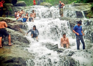 Tourist enjoy themselves at the falls 